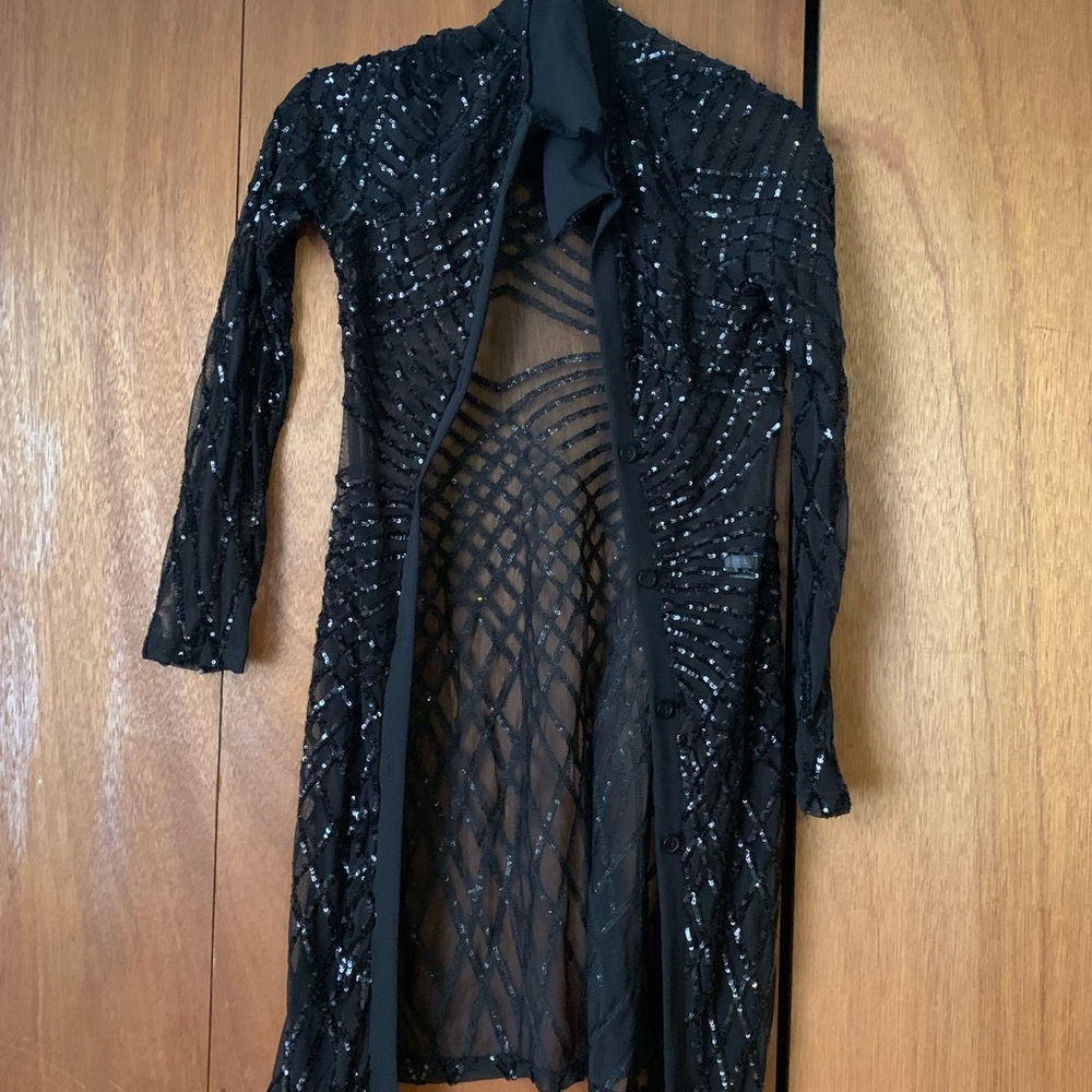 Black sequin over jacket